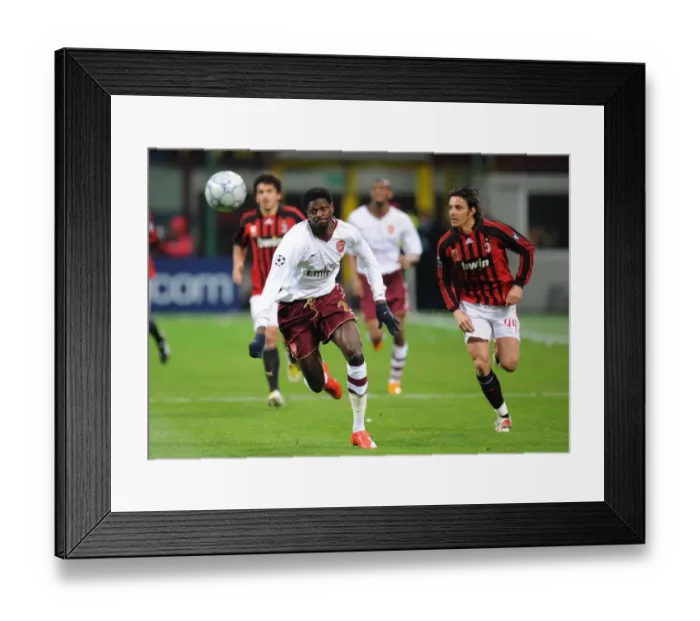 Framed Print : Arsenal's Double Victory: Adebayor Scores Twice as Gunners Overpower AC Milan 2-0 in Champions League Framed Print : Arsenal's Double Victory: Adebayor Scores Twice as Gunners Overpower AC Milan 2-0 in Champions League