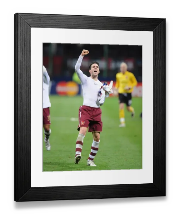 Framed Print : Cesc Fabregas's Triumph: Arsenal's 2-0 Victory Over AC Milan in Champions League