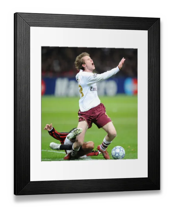 Framed Print : Alex Hleb (Arsenal) is fouled by Massimo Oddo (AC Milan) Framed Print : Alex Hleb (Arsenal) is fouled by Massimo Oddo (AC Milan)