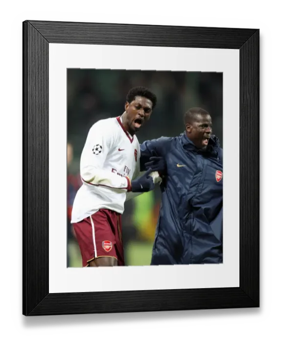 Framed Print : Emmanuel Adebayor celebrates at the final whistle with Emmanuel Eboue (Arsenal) Framed Print : Emmanuel Adebayor celebrates at the final whistle with Emmanuel Eboue (Arsenal)