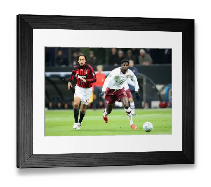 Framed Print : Adebayor and Nesta Clash: Arsenal's Victory Over Milan in the Champions League