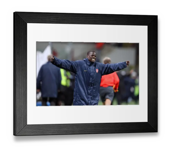 Framed Print : Emmanuel Eboue celebrates at the final whistle (Arsenal) Framed Print : Emmanuel Eboue celebrates at the final whistle (Arsenal)