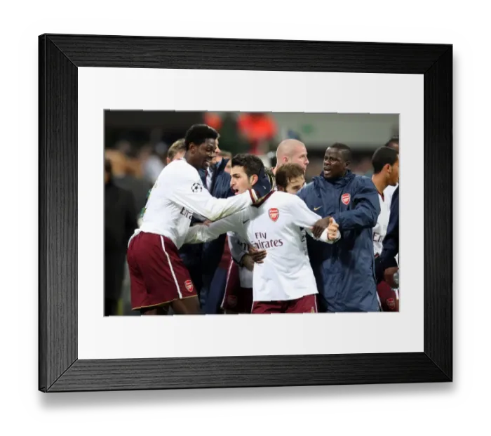 Framed Print : Cesc Fabregas and Teammates Celebrate First Goal: Arsenal's 2-0 Victory Over AC Milan in the UEFA Champions League Framed Print : Cesc Fabregas and Teammates Celebrate First Goal: Arsenal's 2-0 Victory Over AC Milan in the UEFA Champions League
