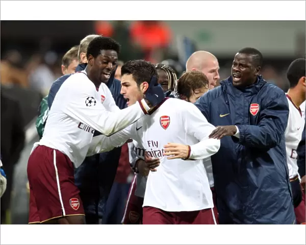 Cesc Fabregas celebrates scoring Arsenals 1st goal with Emmanuel Adebayor