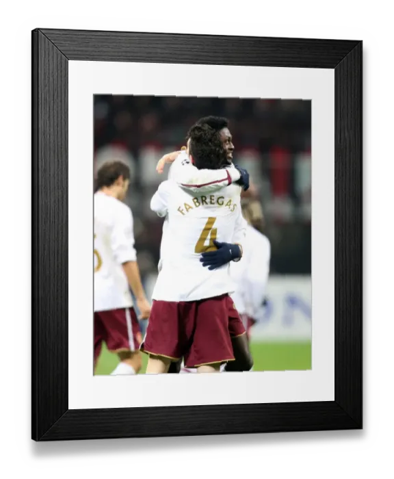 Framed Print : Unforgettable Moment: Fabregas and Adebayor's Euphoric Goal Celebration in Arsenal's 2-0 Victory over AC Milan, UEFA Champions League, 2008 Framed Print : Unforgettable Moment: Fabregas and Adebayor's Euphoric Goal Celebration in Arsenal's 2-0 Victory over AC Milan, UEFA Champions League, 2008