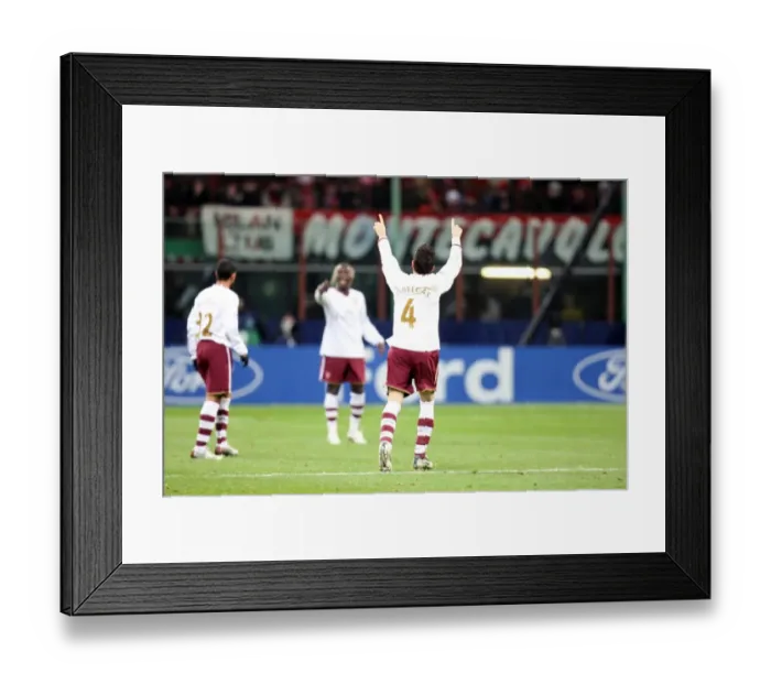 Framed Print : Cesc Fabregas Thrilling Goal: Arsenal's Unforgettable 2-0 Victory over AC Milan in the UEFA Champions League