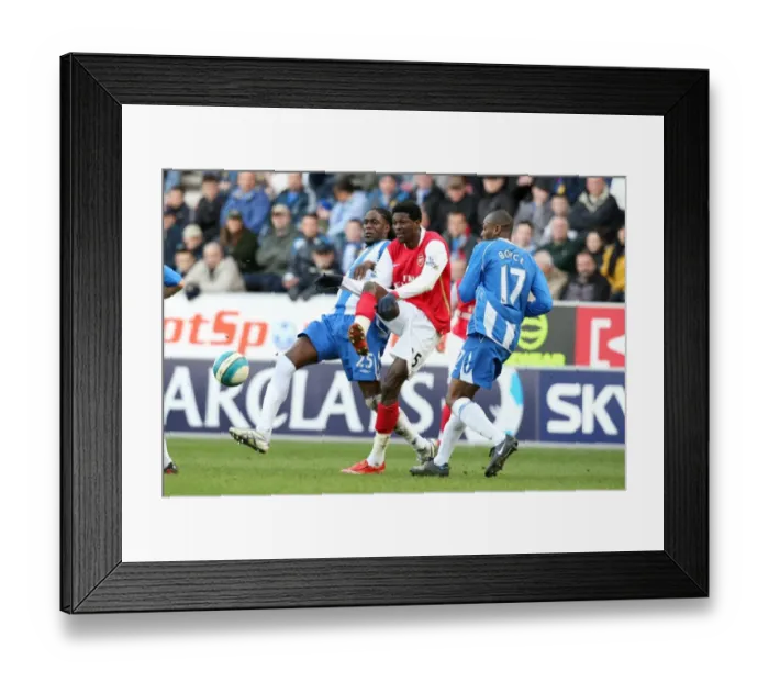 Framed Print : Emmanuel Adebayor (Arsenal) Mario Melchiot and Emmerson Boyce (Wigan)