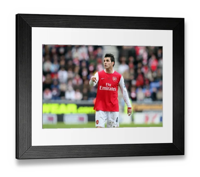 Framed Print : Cesc Fabregas: Unyielding Inspiration at the Heart of Arsenal's 0-0 Battle with Wigan Athletic, September 3, 2008