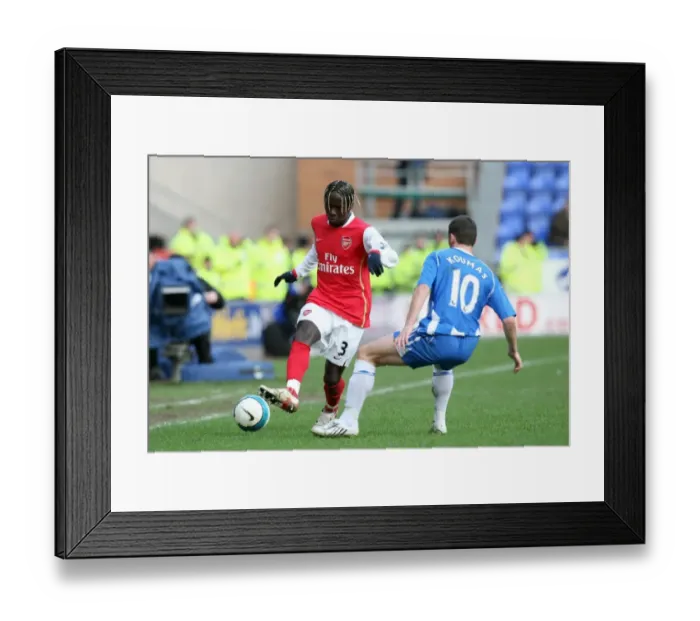 Framed Print : Sagna vs. Koumas: Stalemate at JJB Stadium - Arsenal vs. Wigan, Barclays Premier League, 2008