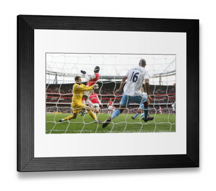 Framed Print : Nicklas Bendtner shoots past Aston Villa goalkeeper Scott Carson and defender Zat Knight to score the Arsenal goal. Arsenal 1: 1 Aston Villa, Barclays Premier League, Emirates Stadium, 1  /  3  /  2008. Credit : Stuart MacFarlane  /  Arsenal
