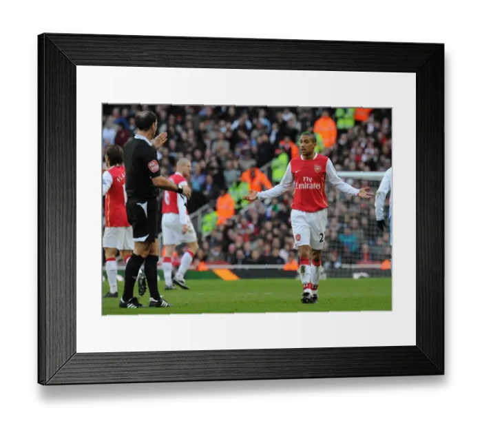 Framed Print : Gael Clichy (Arsenal) talks to referee Mark Clattenburg