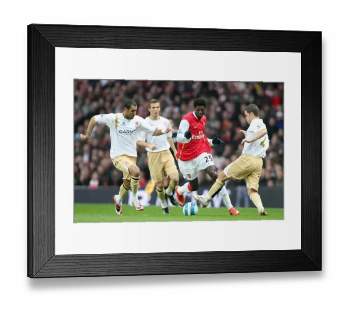 Framed Print : Emmanuel Adebayor (Arsenal) Mohamed Shawky and Luke Young (Boro) Framed Print : Emmanuel Adebayor (Arsenal) Mohamed Shawky and Luke Young (Boro)