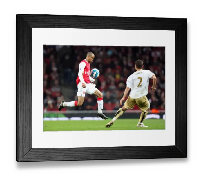 Framed Print : Gael Clichy (Arsenal) Luke Young (Boro) Framed Print : Gael Clichy (Arsenal) Luke Young (Boro)