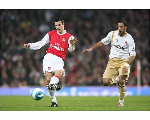 Robin van Persie (Arsenal) Mohamed Shawky (Middlesbrough)