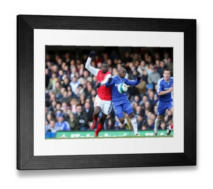 Framed Print : Clash of Titans: Eboue vs Makelele - Chelsea Edge Past Arsenal 2:1 in Premier League Showdown Framed Print : Clash of Titans: Eboue vs Makelele - Chelsea Edge Past Arsenal 2:1 in Premier League Showdown