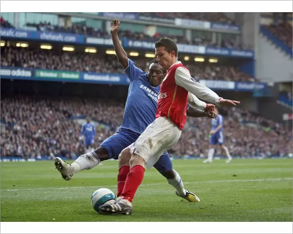 Robin van Persie (Arsenal) Michael Essien (Chelsea)