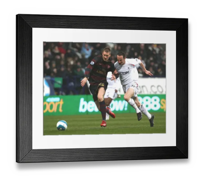 Framed Print : Nicklas Bendtner (Arsenal) Andy O Brien (Bolton)