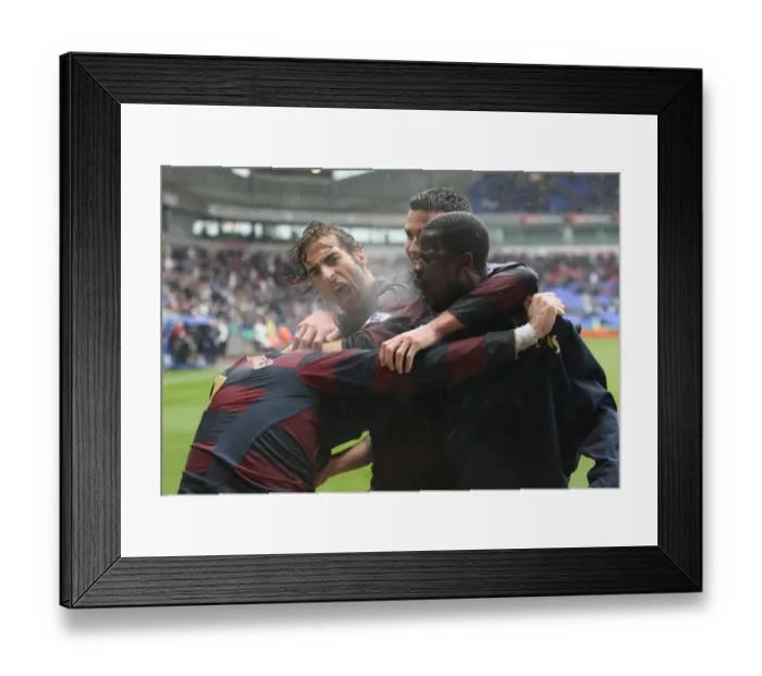 Framed Print : Cesc Fabregas celebrates scoring the 3rd Arsenal goal with Emmanuel Eboue