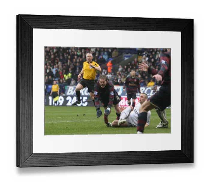 Framed Print : Alex Hleb is tripped by Bolton defender Gary Cahill for the Arsenal penalty