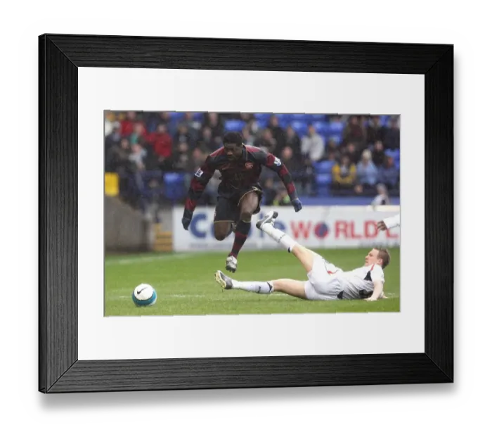 Framed Print : Kolo Toure (Arsenal) Matt Taylor (Bolton) Framed Print : Kolo Toure (Arsenal) Matt Taylor (Bolton)