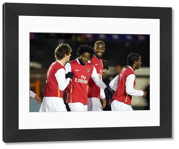 Alex Song celebrates scoring Arsenals goal with Johan Djourou and Havard Nordtveit