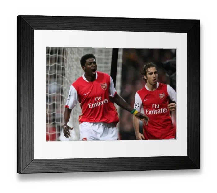 Framed Print : Adebayor and Flamini: Unforgettable Goal Celebration in Arsenal's UEFA Champions League Battle against Liverpool (2008) Framed Print : Adebayor and Flamini: Unforgettable Goal Celebration in Arsenal's UEFA Champions League Battle against Liverpool (2008)