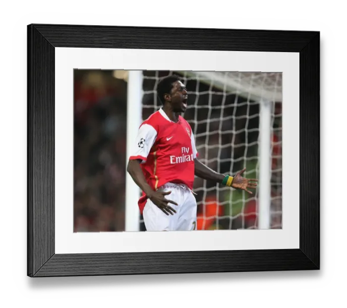 Framed Print : Thrilling Rivalry: Adebayor's Stunner for Arsenal vs. Liverpool, UEFA Champions League Quarter-Finals
