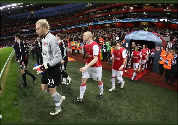 Manuel Almunia and Philippe Senderos (Arsenal) walk out before the match