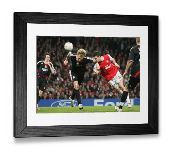 Framed Print : Cesc Fabregas (Arsenal) has his header saves by Pepe Reina, Dirk Kuyt (Liverpool) Framed Print : Cesc Fabregas (Arsenal) has his header saves by Pepe Reina, Dirk Kuyt (Liverpool)
