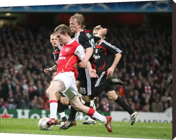 Alex Hleb (Arsenal) is fouled by Dirk Kuyt but a penalty isn t given