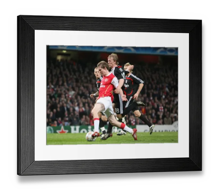Framed Print : Alex Hleb (Arsenal) is fouled by Dirk Kuyt but a penalty isn t given