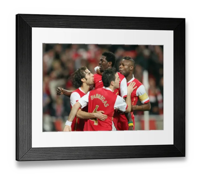 Framed Print : Adebayor's Dramatic Goal: Arsenal Stars Celebrate in the Quarters vs. Liverpool, UEFA Champions League Framed Print : Adebayor's Dramatic Goal: Arsenal Stars Celebrate in the Quarters vs. Liverpool, UEFA Champions League