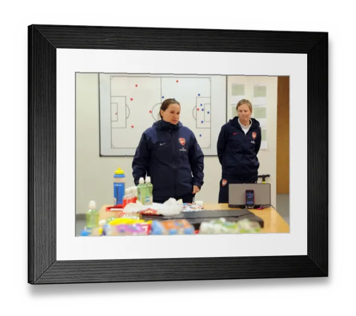 Framed Print : Arsenal Ladies: Manager Laura Harvey and Assistant Rihanne Skinner Planning Their Strategy Against Chelsea
