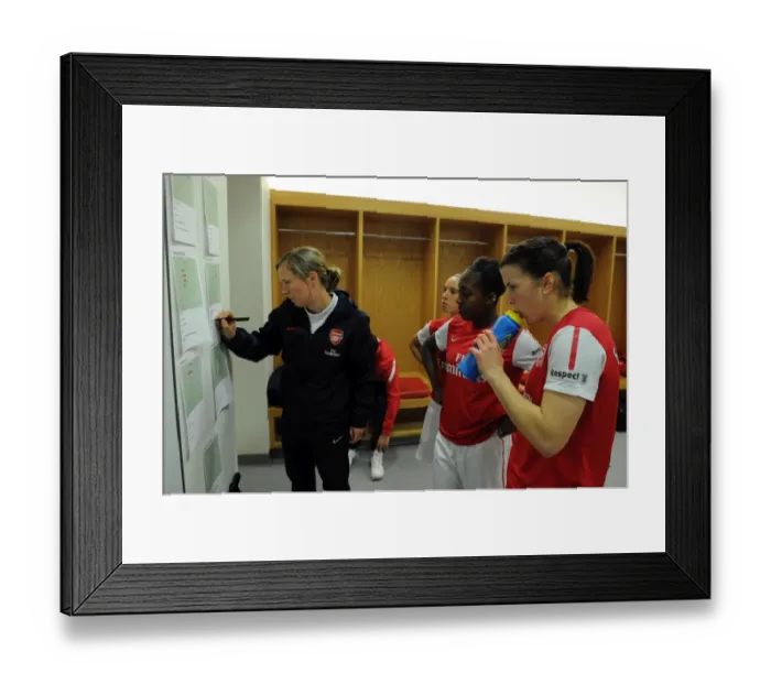 Framed Print : Rihanne Skinner (Assistant Manager) shows Danielle Carter and Niamh Fahey the tactics boards