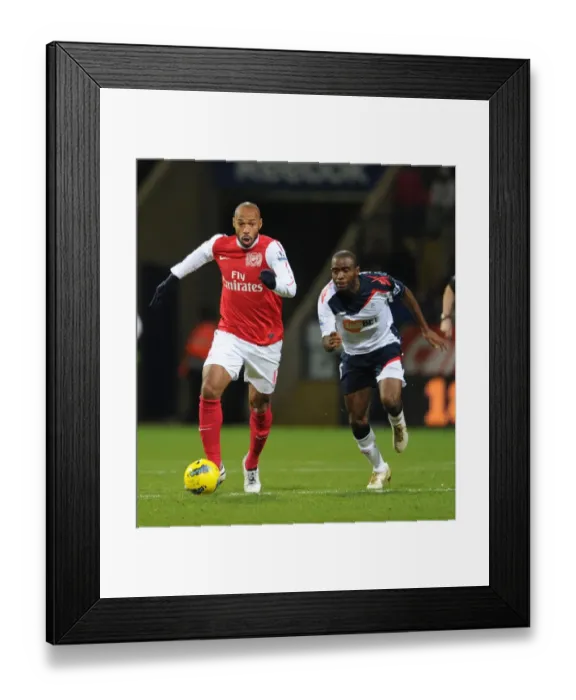 Framed Print : Thierry Henry Outmaneuvers Fabrice Muamba: Bolton Wanderers vs. Arsenal, Premier League 2011-2012