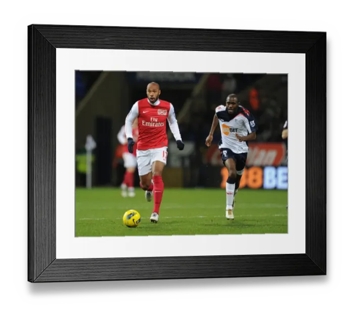 Framed Print : Thierry Henry's Agile Outmaneuver of Fabrice Muamba: A Premier League Legend's Moment, 2012