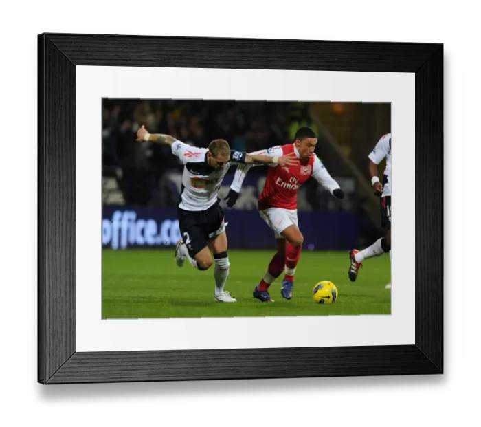Framed Print : Arsenal's Alex Oxlade-Chamberlain Outmaneuvers Bolton's Gretar Steinsson