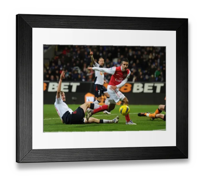 Framed Print : Van Persie vs. Wheater: Intense Battle at the Reebok Stadium - Arsenal vs. Bolton Wanderers, Premier League 2011-12 Framed Print : Van Persie vs. Wheater: Intense Battle at the Reebok Stadium - Arsenal vs. Bolton Wanderers, Premier League 2011-12