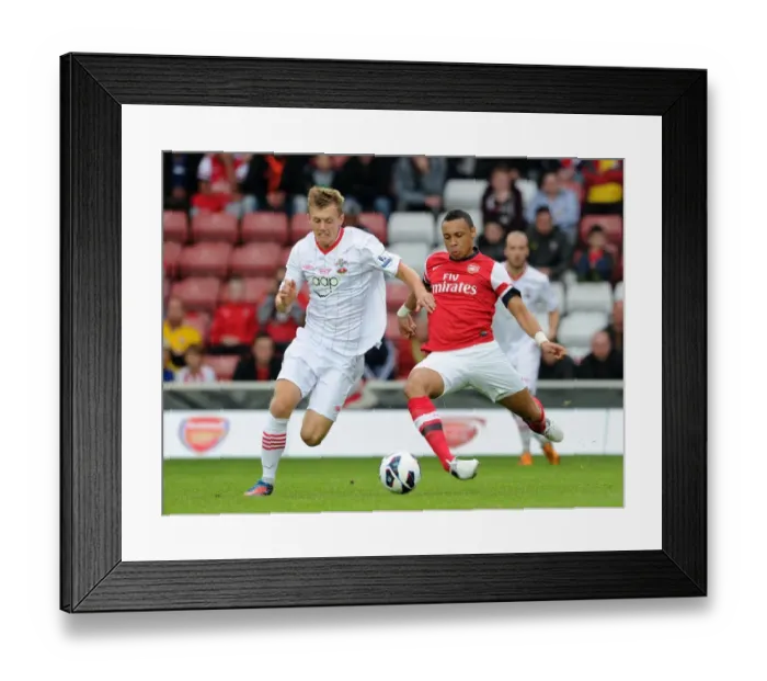 Framed Print : Coquelin vs Ward-Prowse: Battle in the Pre-Season Friendly between Southampton and Arsenal