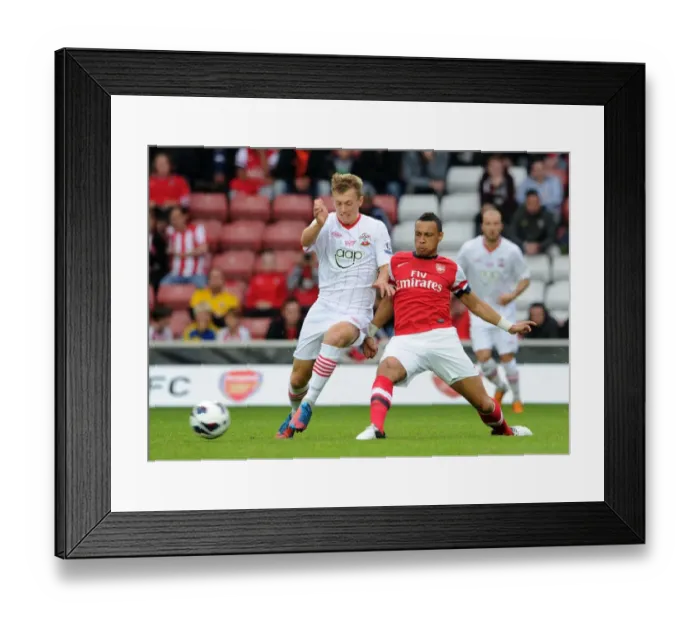 Framed Print : Coquelin vs Ward-Prowse: Clash in the Pre-Season Friendly between Southampton and Arsenal Framed Print : Coquelin vs Ward-Prowse: Clash in the Pre-Season Friendly between Southampton and Arsenal