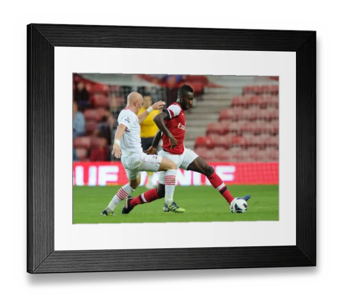 Framed Print : Johan Djourou vs. Richard Chaplow: Clash in the Markus Liebherr Memorial Cup Pre-Season Match
