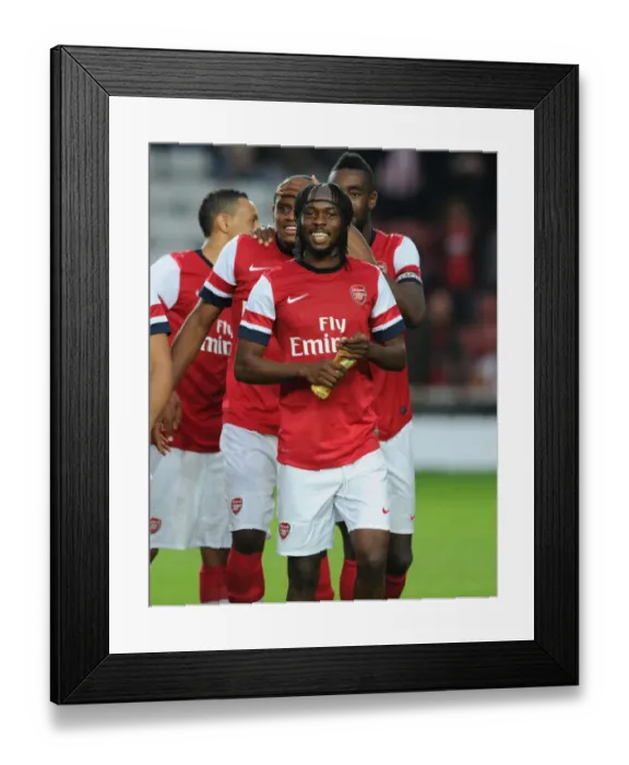 Framed Print : Arsenal vs Southampton: Pre-Season Clash in the Markus Liebherr Memorial Cup, 2012