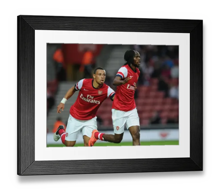Framed Print : Arsenal: Gervinho and Coquelin Celebrate Goal Against Southampton (2012-13 Pre-Season) Framed Print : Arsenal: Gervinho and Coquelin Celebrate Goal Against Southampton (2012-13 Pre-Season)
