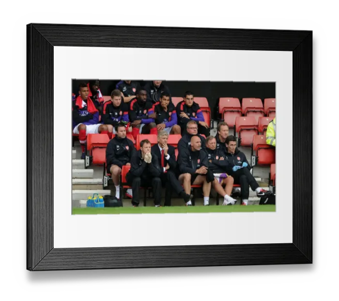 Framed Print : Arsene Wenger and Steve Bould on the Arsenal Bench: Arsenal v Anderlecht Pre-Season 2012-13
