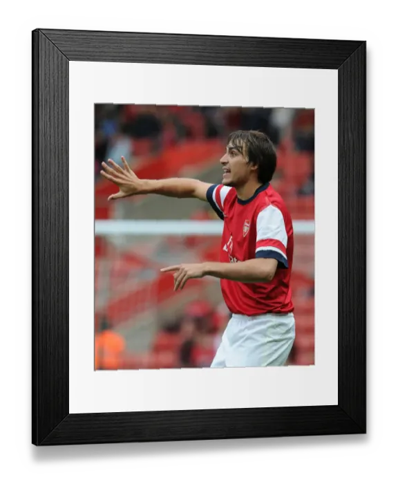 Framed Print : Arsenal's Ignasi Miquel Scores the Winning Goal Against Anderlecht in The Markus Liebherr Memorial Cup Framed Print : Arsenal's Ignasi Miquel Scores the Winning Goal Against Anderlecht in The Markus Liebherr Memorial Cup