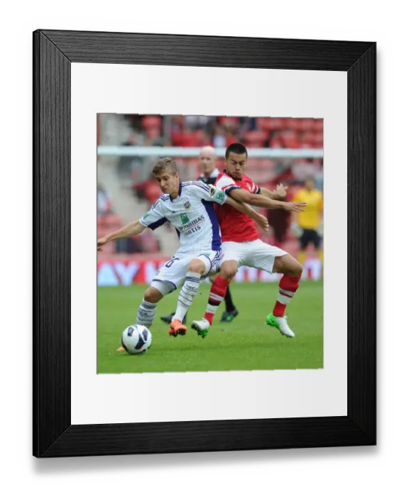 Framed Print : Arsenal vs. Anderlecht: Nico Yennaris Tackles Dennis Praet in 2012 Pre-Season Clash