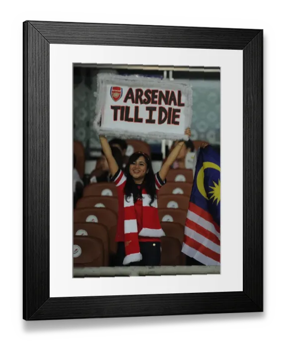 Framed Print : Arsenal Fans in Malaysia: A Sea of Red during the 2012-13 Pre-Season Match against Malaysia XI
