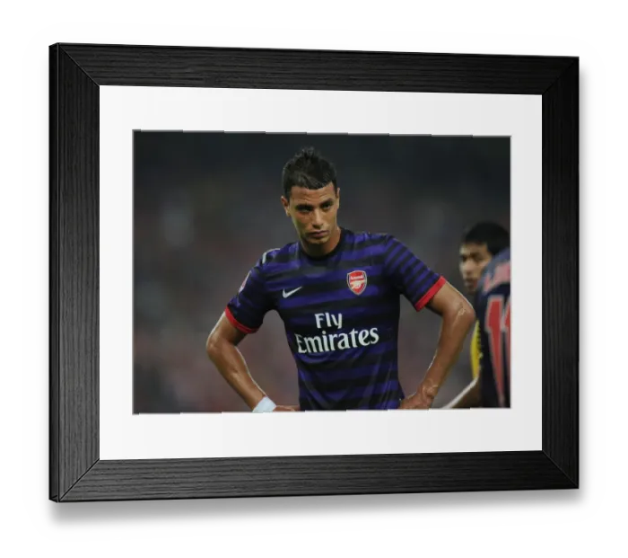 Framed Print : Arsenal's Marouane Chamakh in Action against Malaysia XI (2012) Framed Print : Arsenal's Marouane Chamakh in Action against Malaysia XI (2012)