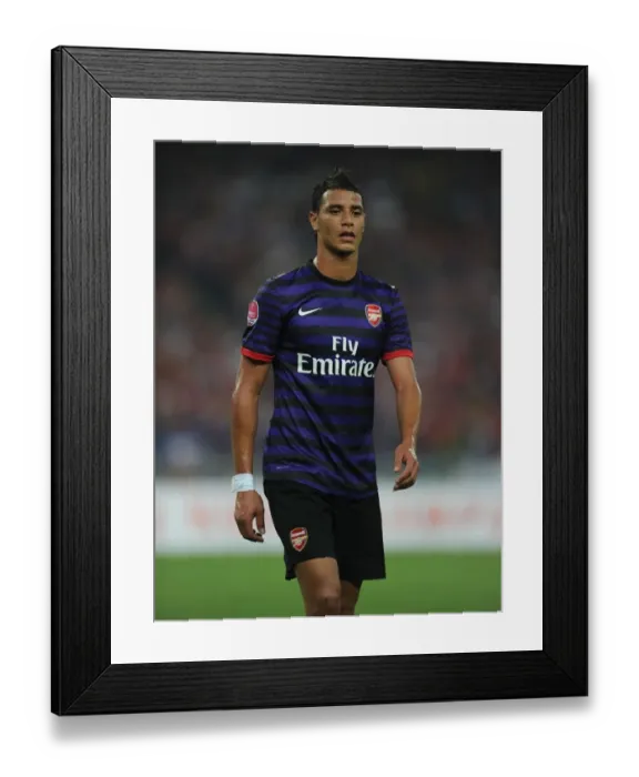 Framed Print : Arsenal's Marouane Chamakh in Action against Malaysia XI (2012)