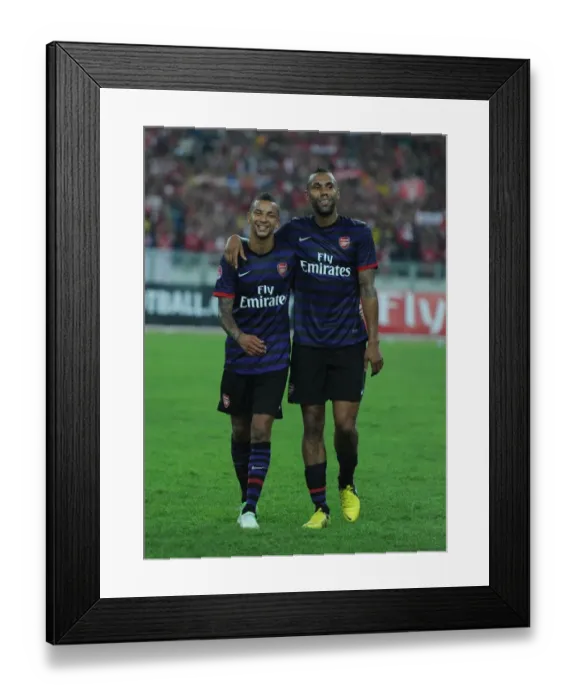 Framed Print : Arsenal Players Craig Eastmond and Kyle Bartley Post-Match, Malaysia XI vs Arsenal (2012) Framed Print : Arsenal Players Craig Eastmond and Kyle Bartley Post-Match, Malaysia XI vs Arsenal (2012)